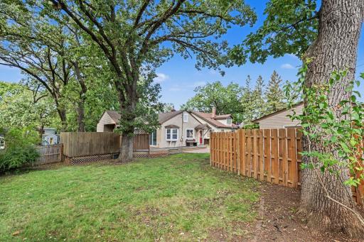 Breathtaking back yard with cedar privacy fence throughout