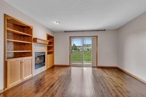 Great views from the great room along with cozy fireplace and built-ins