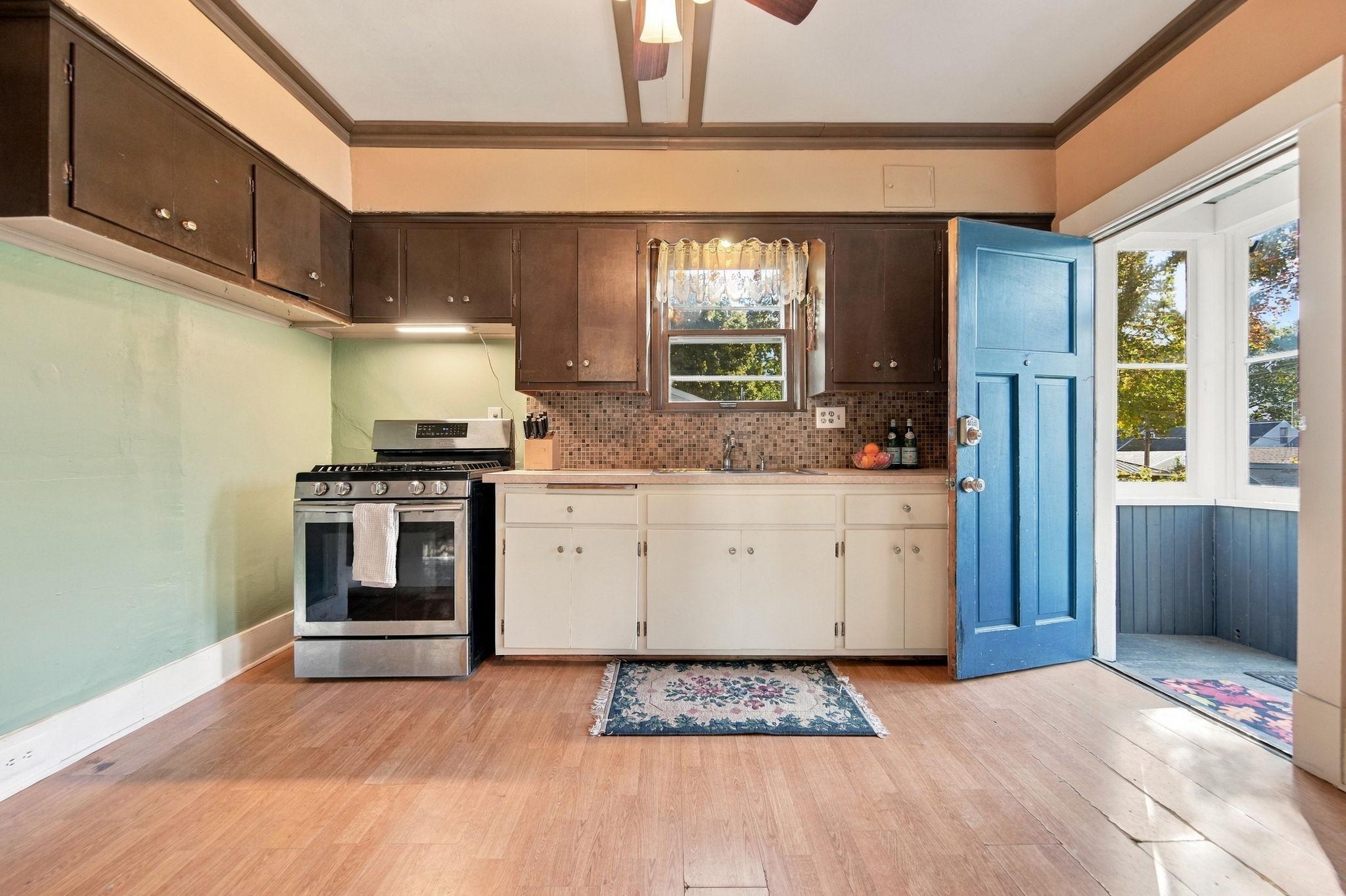 Stainless steel appliances and access to back deck