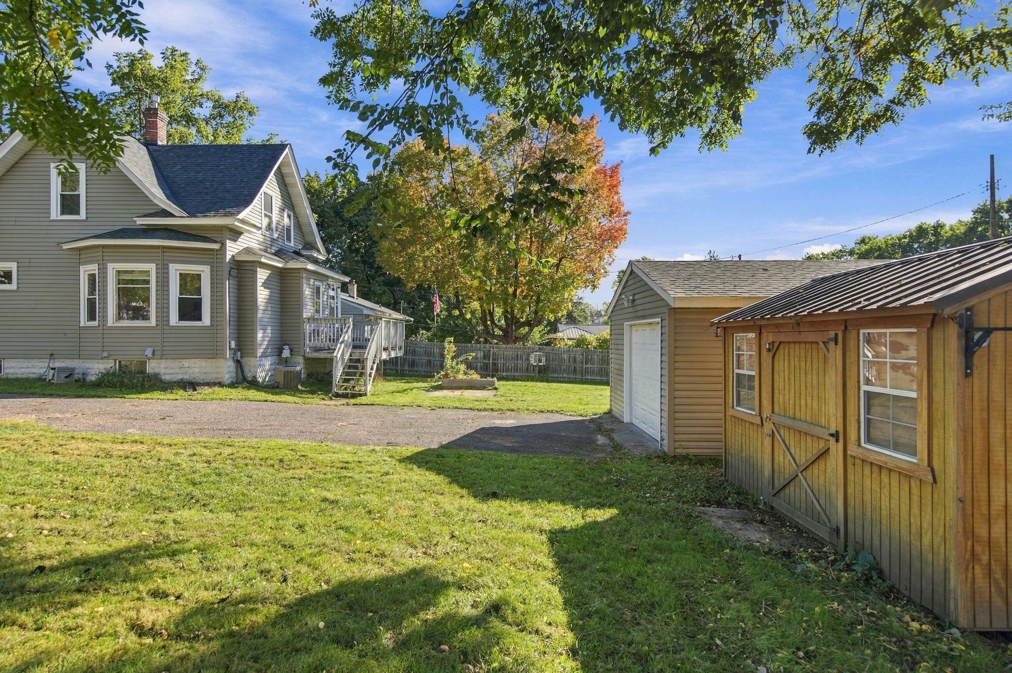 Storage shed by garage