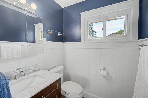 New lighting and vanity with special storage below.