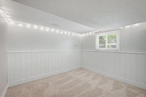 Bedroom in lower level. New carpet and and freshly painted