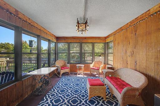 Three season porch with combination window to close it up for winter. This lead out to the deck for easy access to back yard