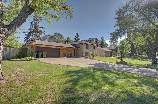This home has a 2 car garage with a workshop attached that give you extra storage and a work bench