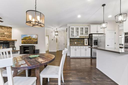 Entrance view from your backyard to the kitchen and ML family room. Buyers will love the current lighting and feel of this home throughout.