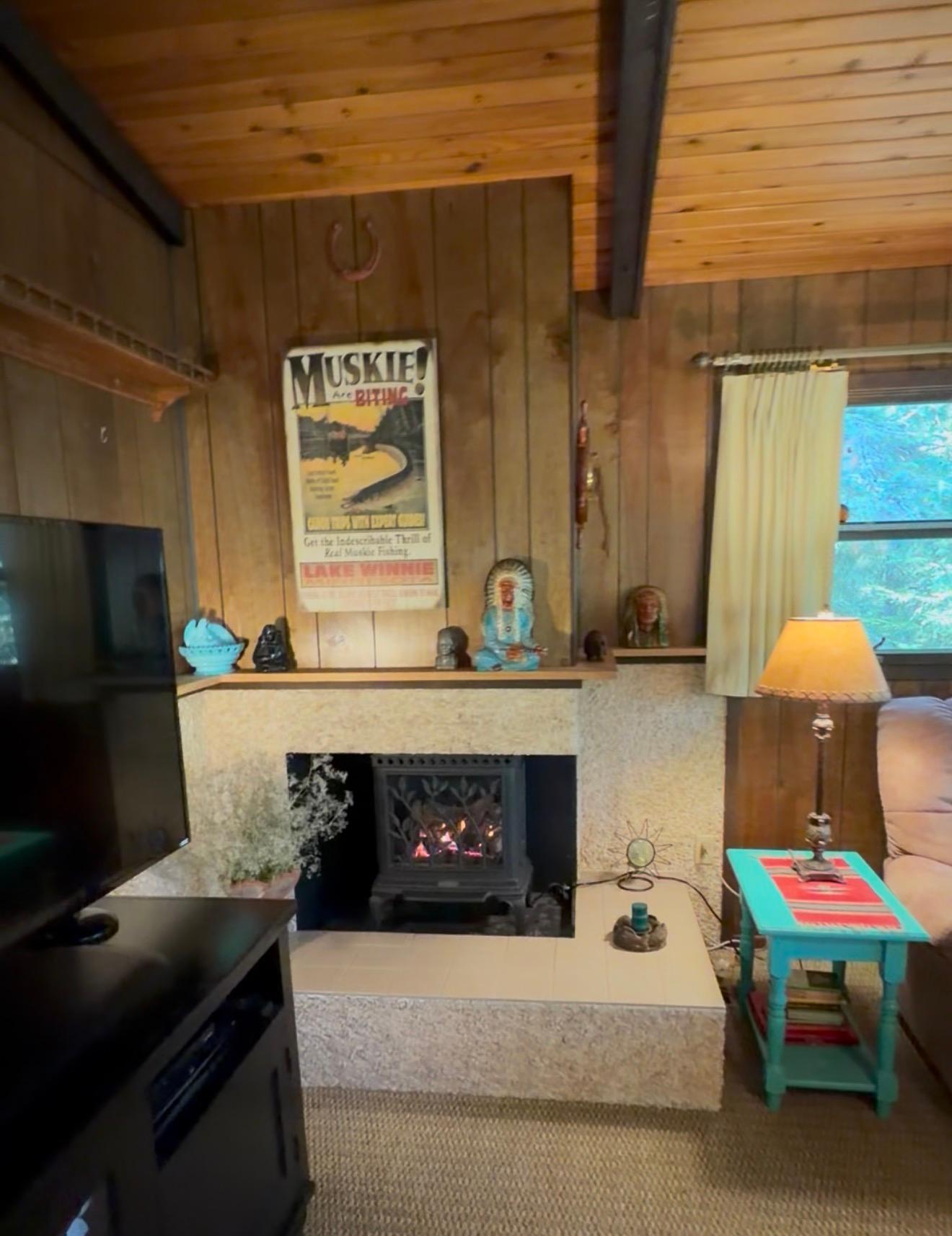 Fireplace with insert and custom-built rock surround.