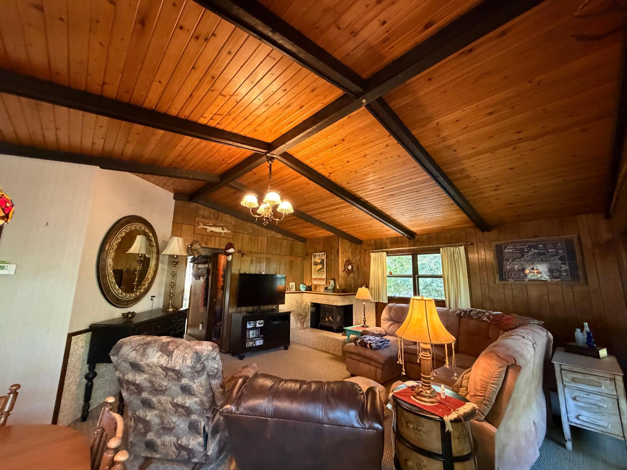 Vaulted ceilings throughout this large living room. Plenty of room for entertaining and relaxing.