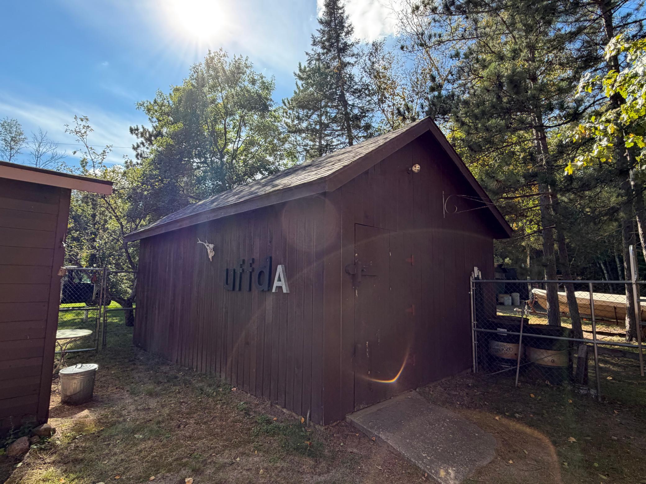 Oversized shed next to the garage.