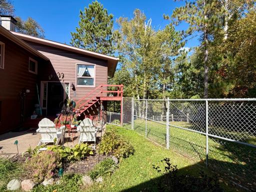 Fenced-in area between the home and garage.
