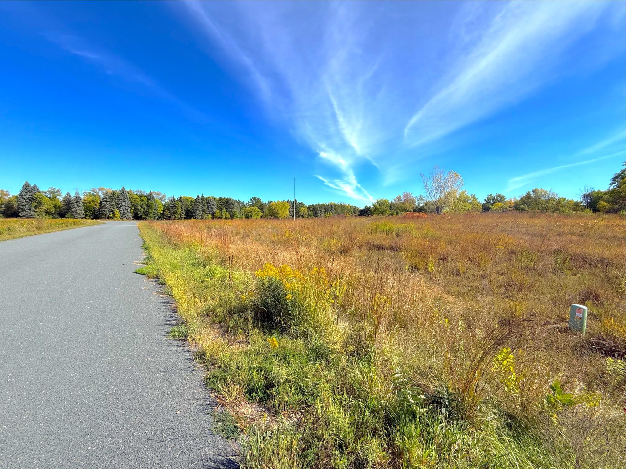 Rolling wooded acres lead toward the shoreline, creating an exceptional setting to set your home among the trees and enjoy views in every direction.