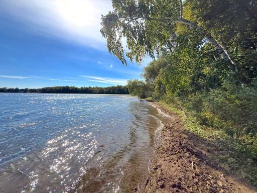 Build your dream home surrounded by nature with beautiful views of both Mirror Pond and 200 feet of Lake Sylvia shoreline. A rare setting with water views in multiple directions.