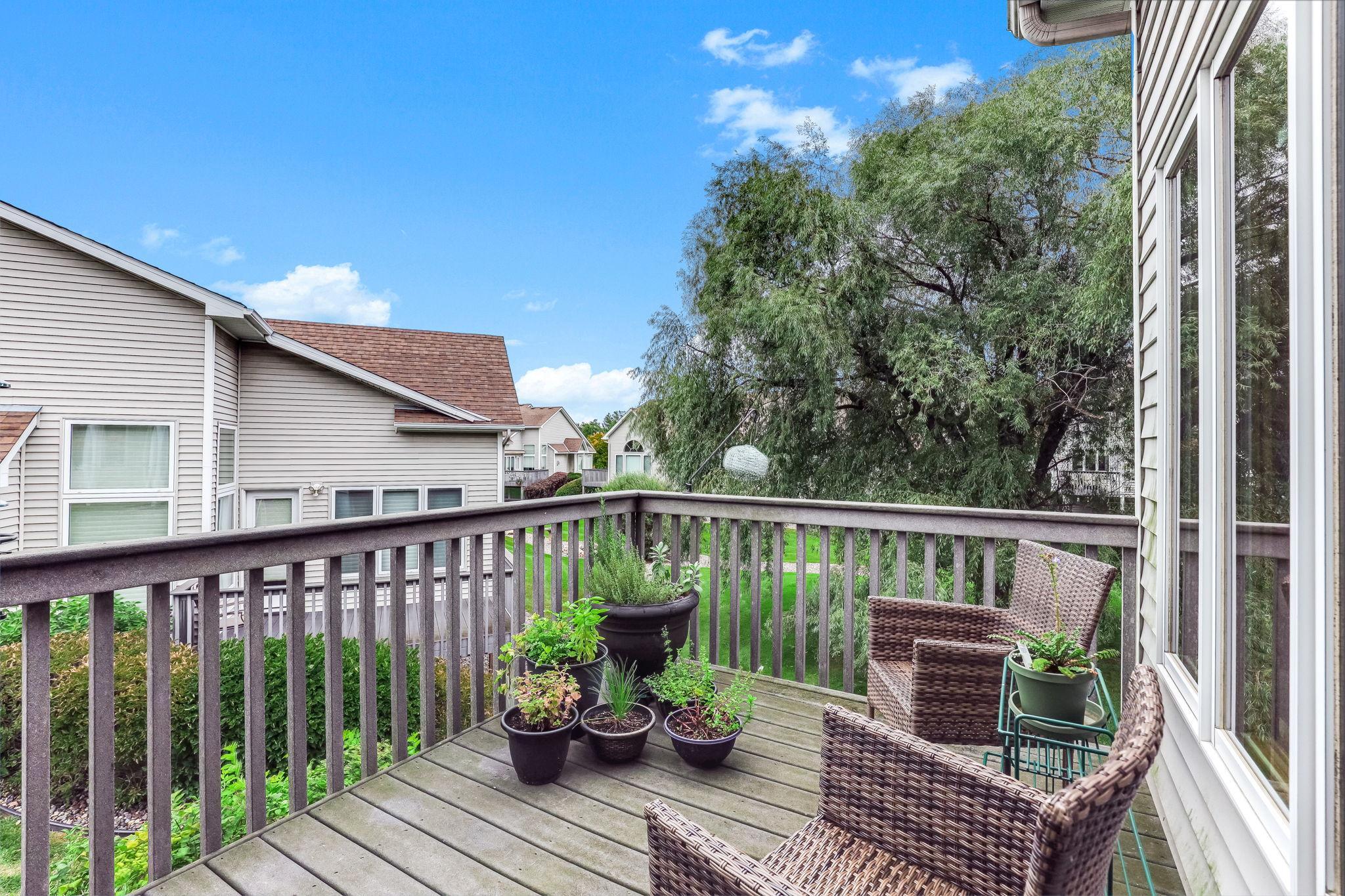 Welcoming deck is off the sunroom - use the built-in awning if the sun gets too bright