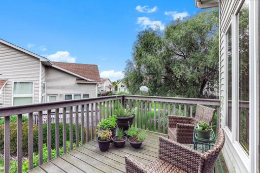 Welcoming deck is off the sunroom - use the built-in awning if the sun gets too bright