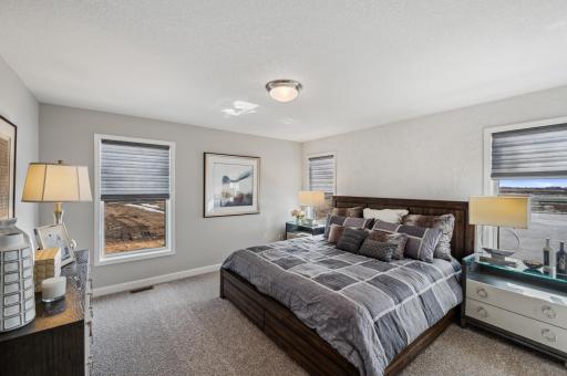 (Photo of model home, actual features may vary) Situated on the upper level, the tranquil ownerâs suite is made for rest and relaxation and includes a serene bedroom, spa-inspired bathroom and oversized walk-in closet.