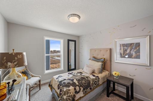 (Photo of model home, actual features may vary) This comfortable bedroom is flexible in nature and can easily transform to accommodate the evolving needs of residents. Itâs also adjacent to a full-sized bathroom for enhanced convenience.