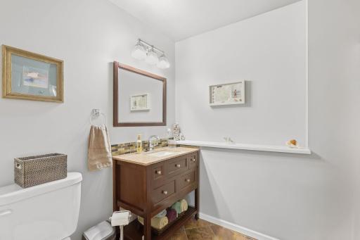 Lower level 3/4 custom finished bathroom off of family room