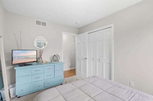 Upstairs bedroom with newer carpet, recently painted, light & bright.