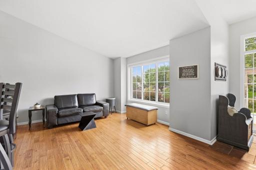 View of vaulted entryway, light & bright, fresh newer hickory floors.