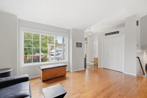 View of vaulted entryway, light & bright, fresh newer hickory floors.