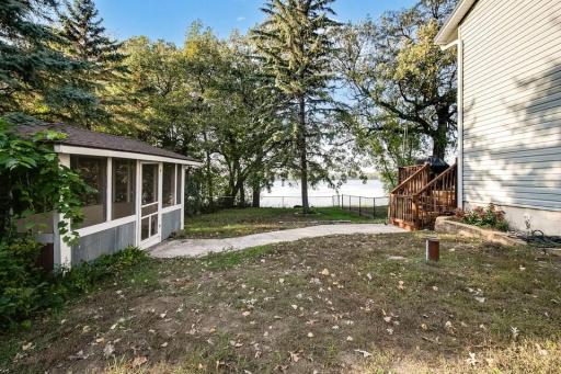 Fenced outdoor area plus a screened gazebo, all just steps from the lake.