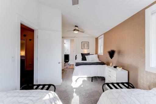 Additional bedroom with flexible sleeping arrangements and plenty of natural light.