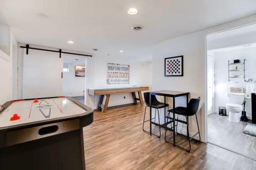 Flexible lower-level recreation area offers even more room for guests to spread out.