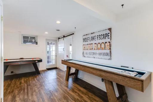 Game room is ready for shuffleboard, friendly competition, and rainy-day fun.