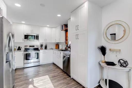 A functional layout with plenty of cabinetry and workspace.