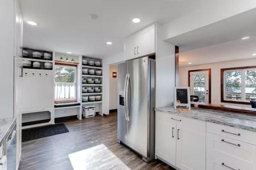 Generous kitchen storage and stainless steel appliances make hosting a breeze.