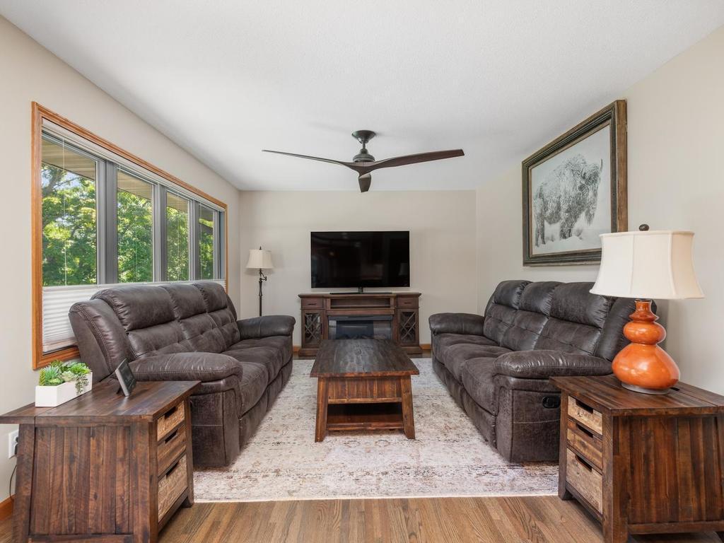 Large windows bring natural light into the main-level living room.