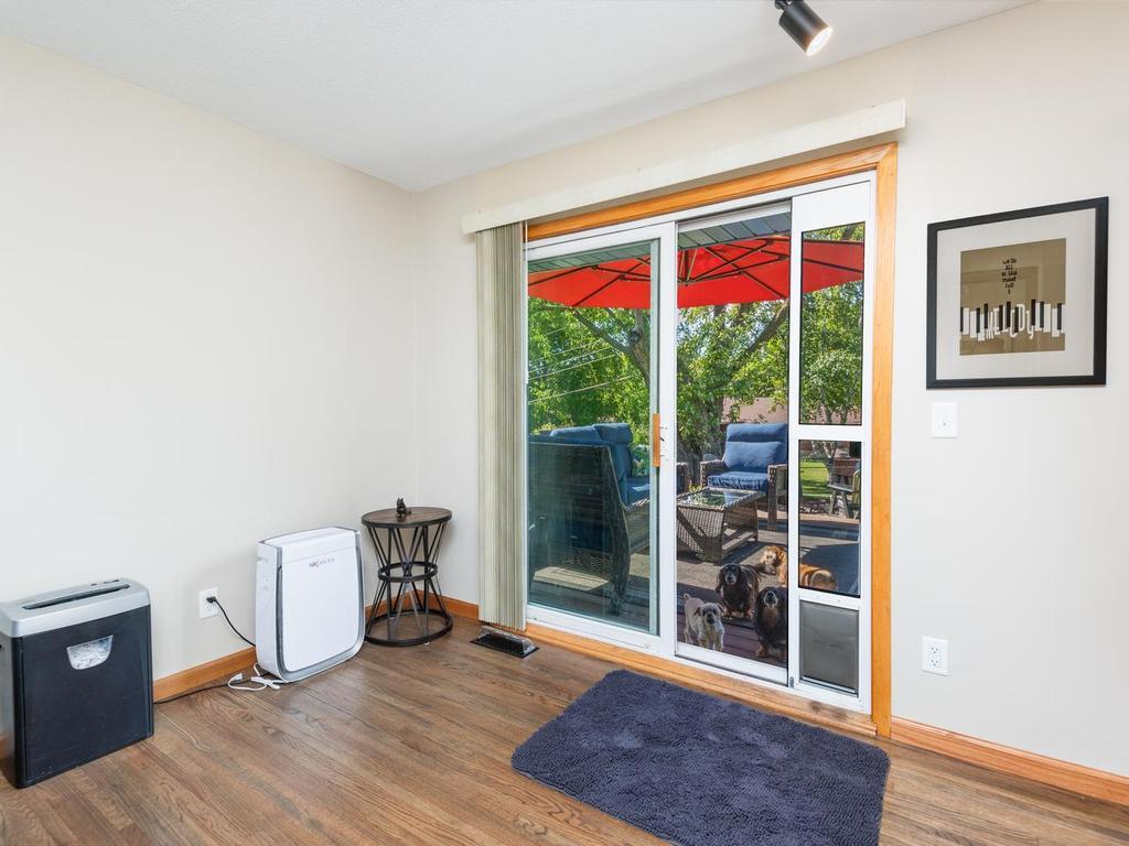 Sliding doors provide access to the deck and backyard.