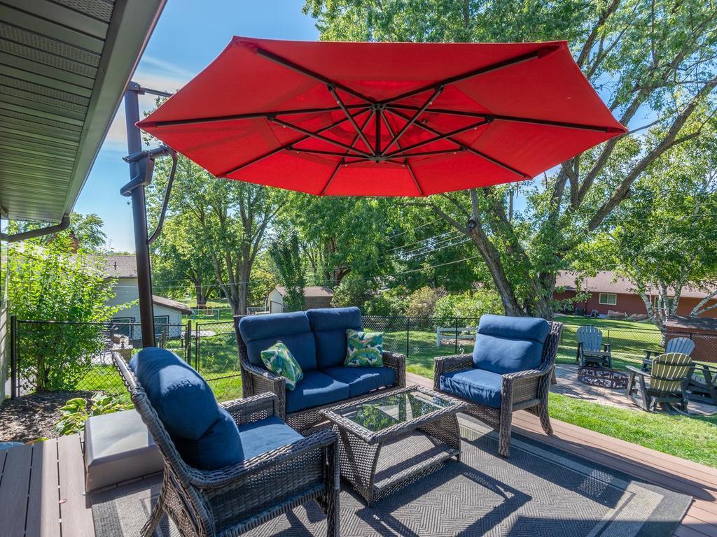 The backyard deck provides a comfortable spot to relax outdoors.