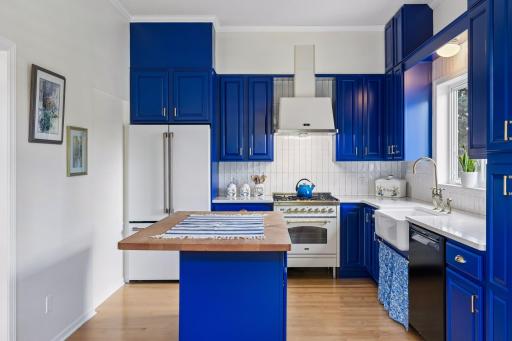 The high end, very Swedish, very charming kitchen greets you with a smile. The appliance set was curated to fit beautifully and anchor the space.