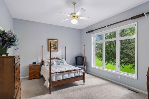 The large, private, primary bedroom suite is extraordinary.