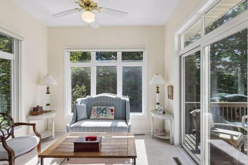 The best sun room on the block, with privacy provided by the tree line and sunshine filling the room.