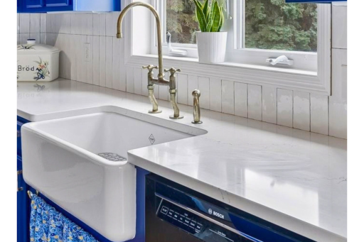 Gorgeous bib front sink with beautiful countertops and a bright window!