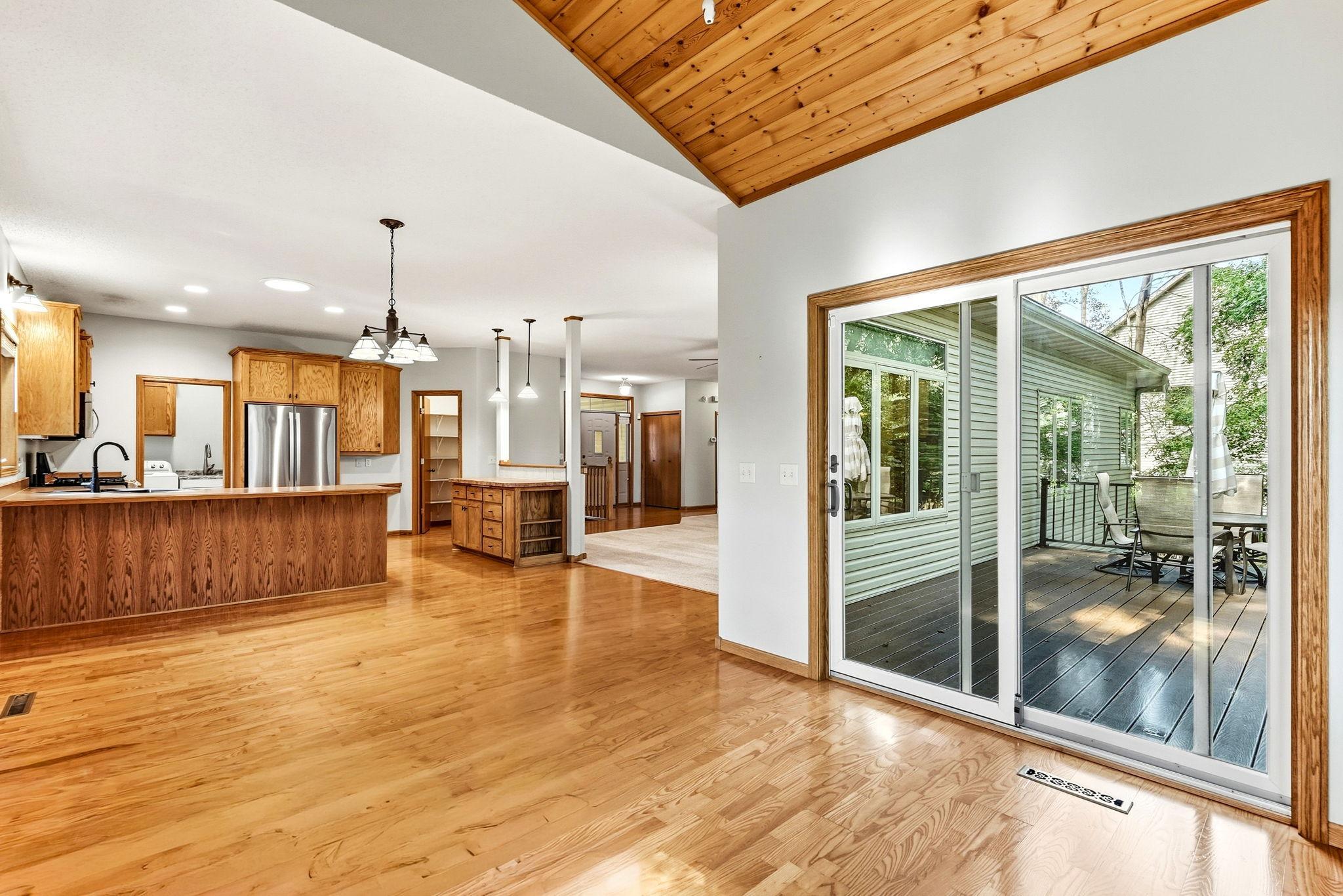 Walk-out from the Sunroom to the ground level Deck!