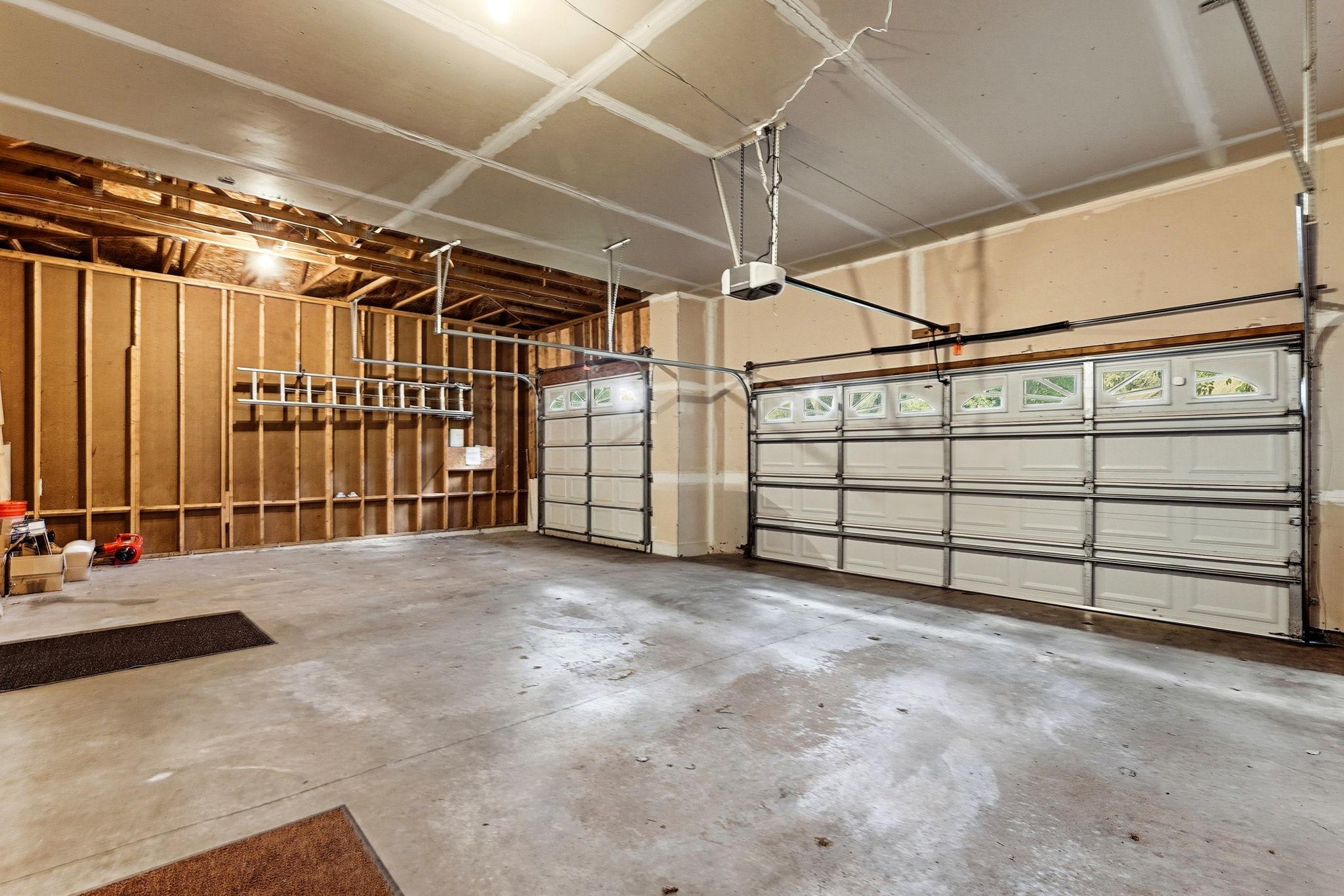 Triple Garage with Extra Tall Sidewalls!