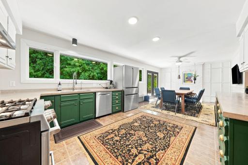 Roomy eat-in Kitchen adjacent to Family Room provides extended room for entertaining