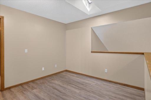 Loft features a skylight and flexible space for a home office, reading nook or additional sitting area.