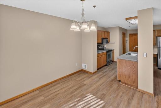 Open dining and kitchen layout creates an easy flow for everyday living and entertaining.
