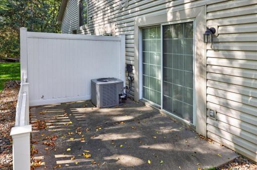 Patio access from the dining room creates an inviting extension of the living space.