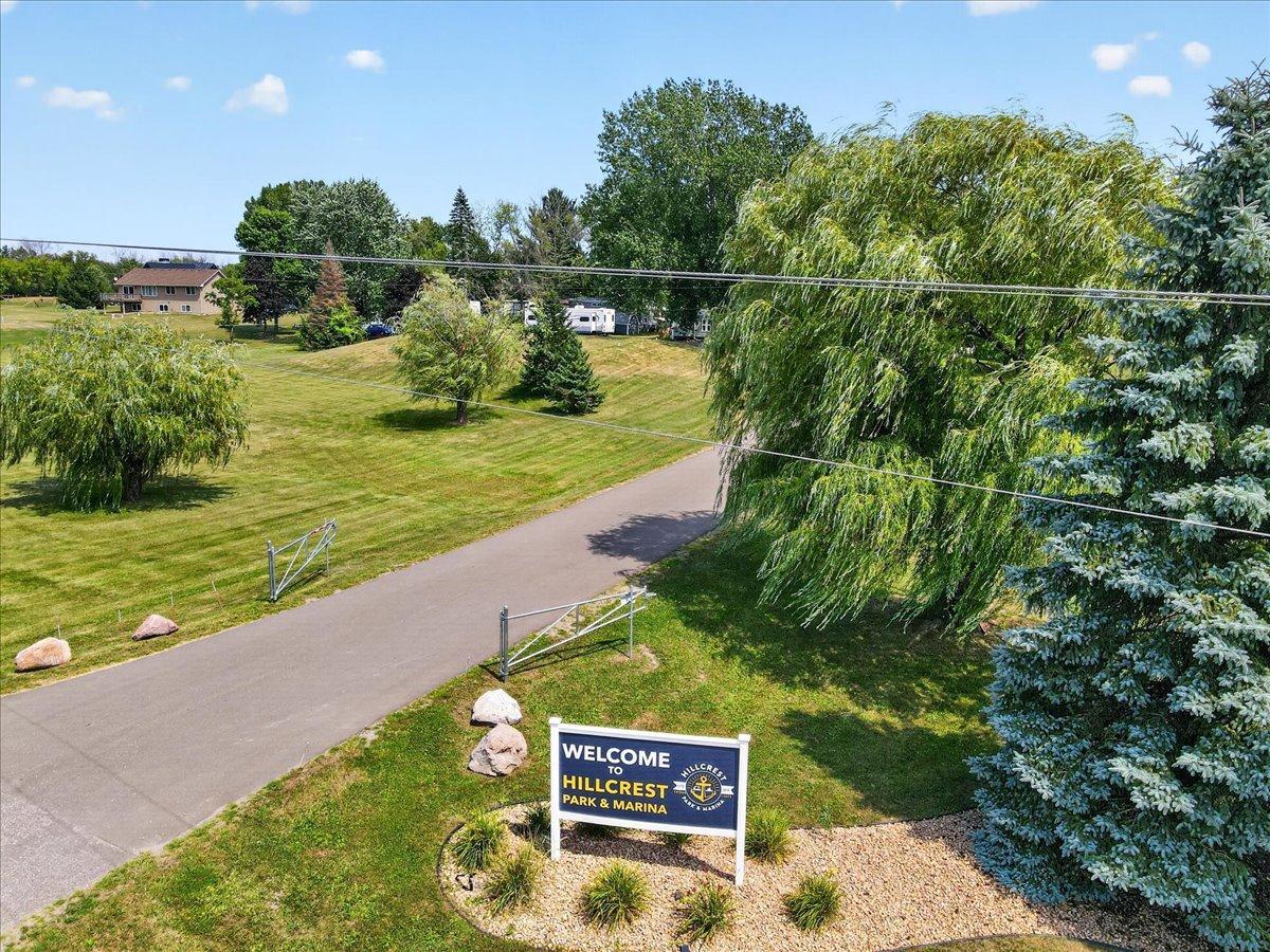 Another welcoming aerial perspective of the entrance and landscaped grounds.