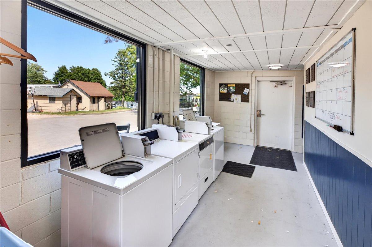 Bright, well-maintained laundry facility provides a convenient amenity for park residents.