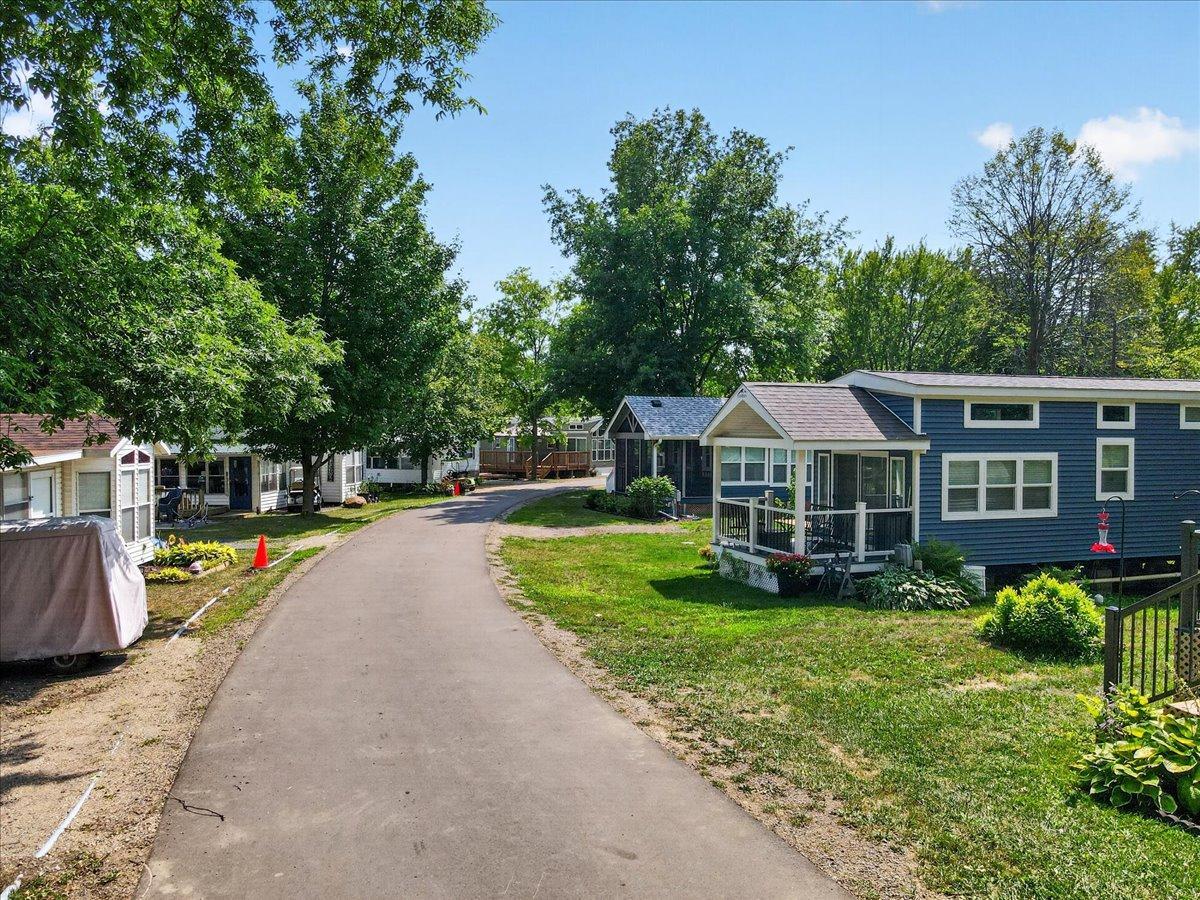 Well-maintained paved roads wind through the established RV park.