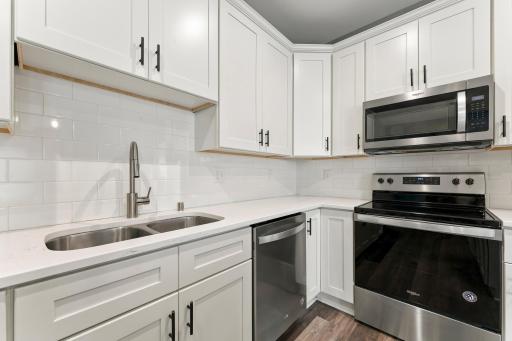 Lots of cabinet and counter space. Notice the stainless steel appliances, too!