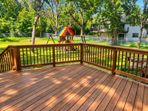 Newly resurfaced deck, playset included.png