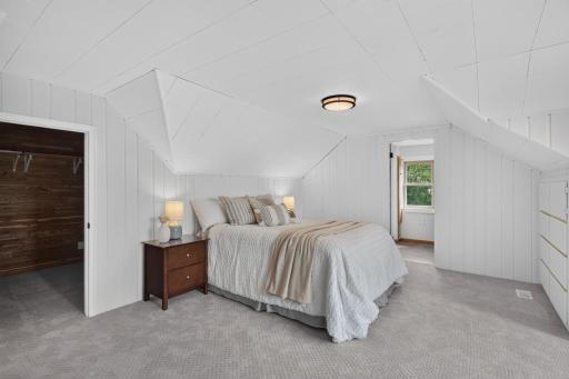 Upstairs Primary with private 3/4 Bathroom, walk in closet, and built in drawers