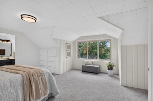 Upstairs Primary with private 3/4 Bathroom, walk in closet, and built in drawers