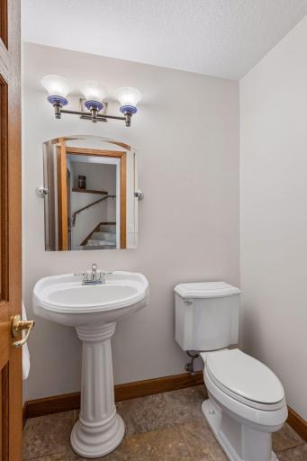 There is also a convenient powder room on the main level, right by the entrance.